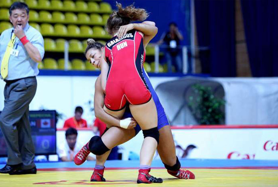 A photo of two female athletes competiting against each other at the Pan Am.