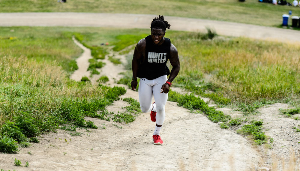Wayne Moore running hill sprints before making it to the CFL