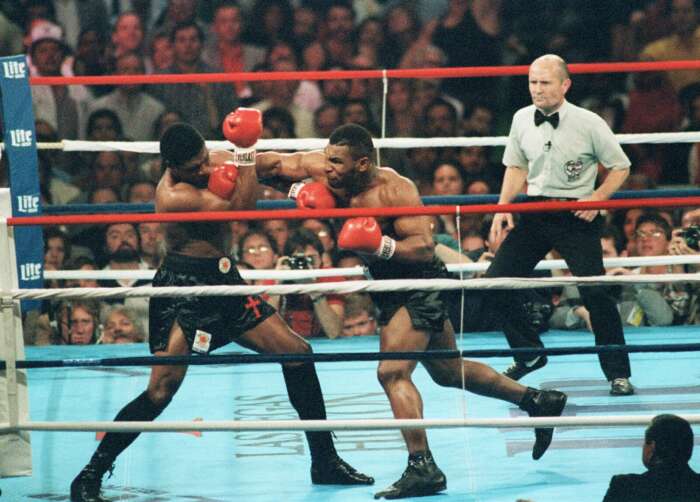 Mike Tyson competing in the ring.